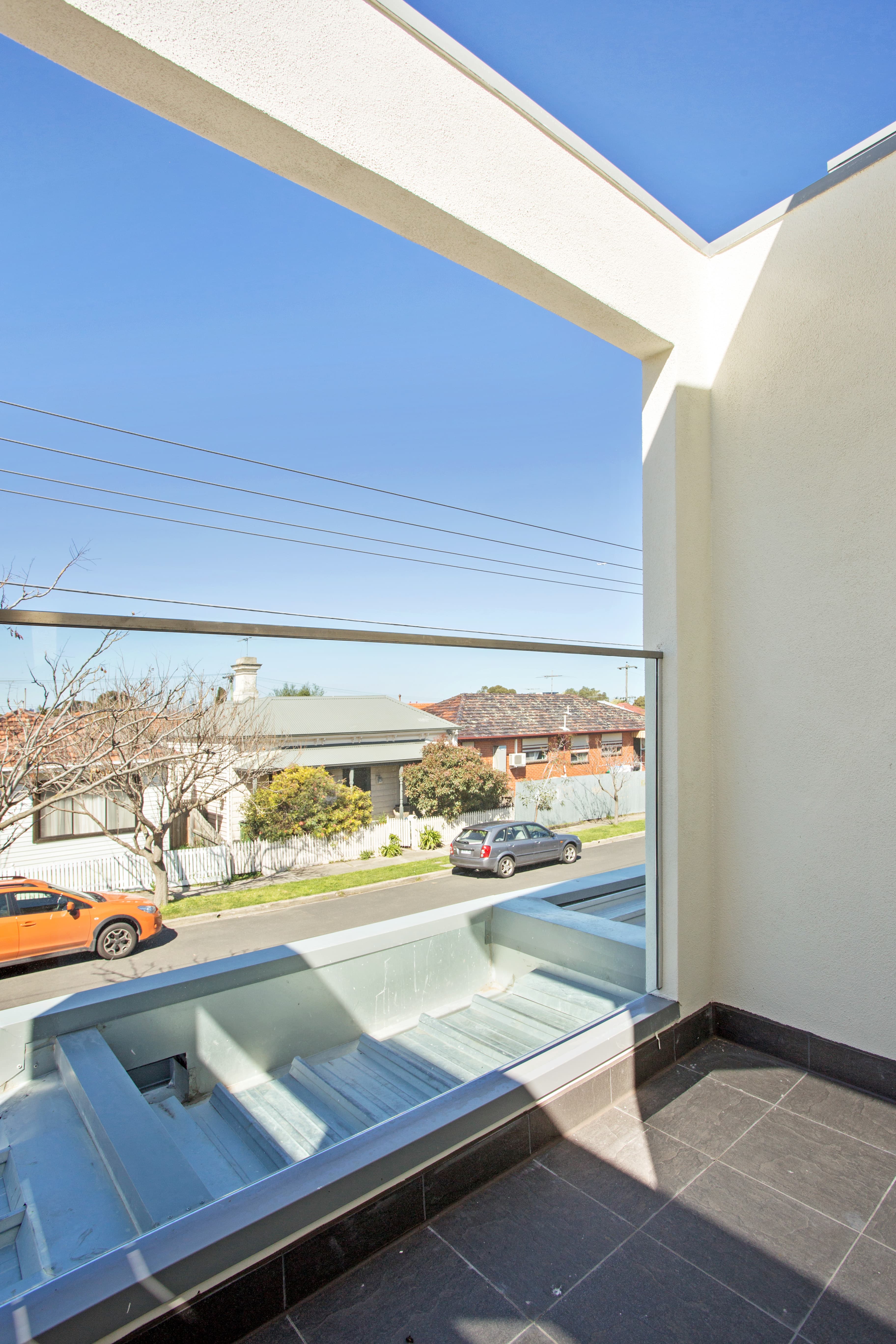 Chatham Street upper-level balcony with glass balustrade and street outlook