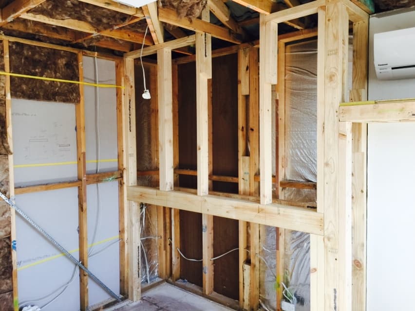 Foreman Way new room extension - full timber frame with insulation batts and AC rough-in position marked