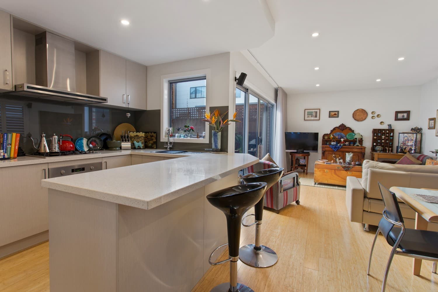 Kitchen with repositioned sink and breakfast bench