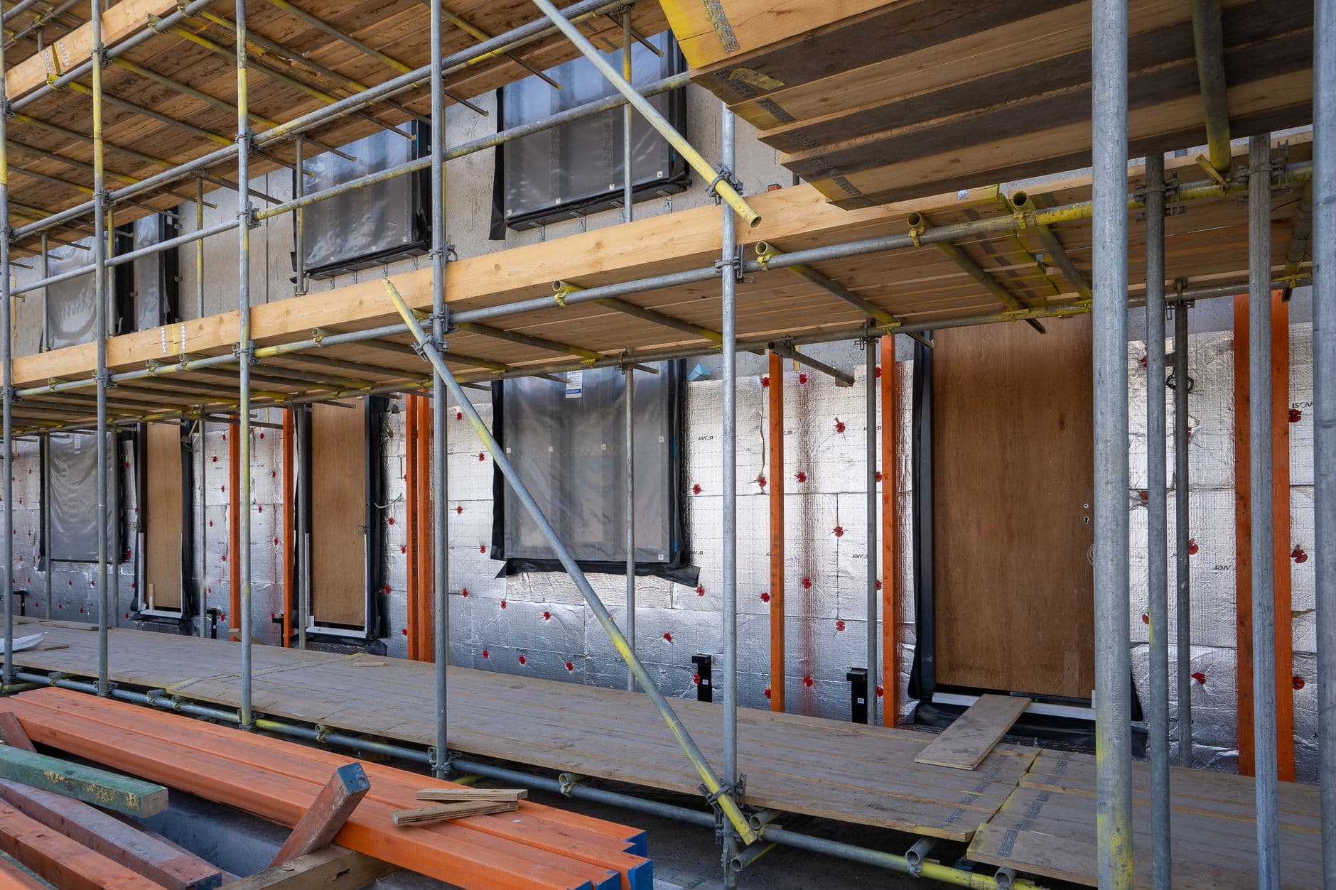 Residential upper-level construction with scaffolding, Melbourne
