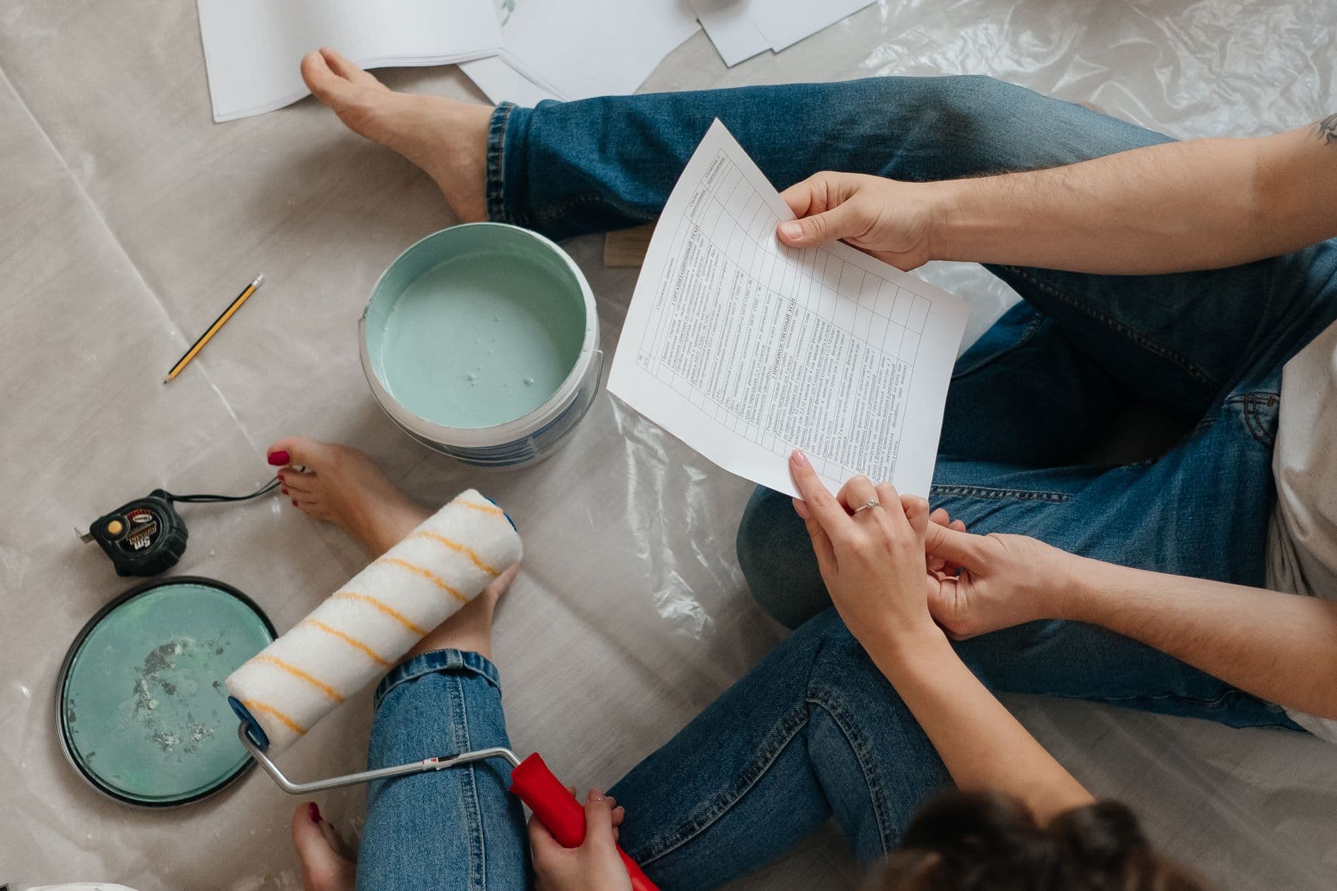 Homeowners reviewing a written quote during a renovation